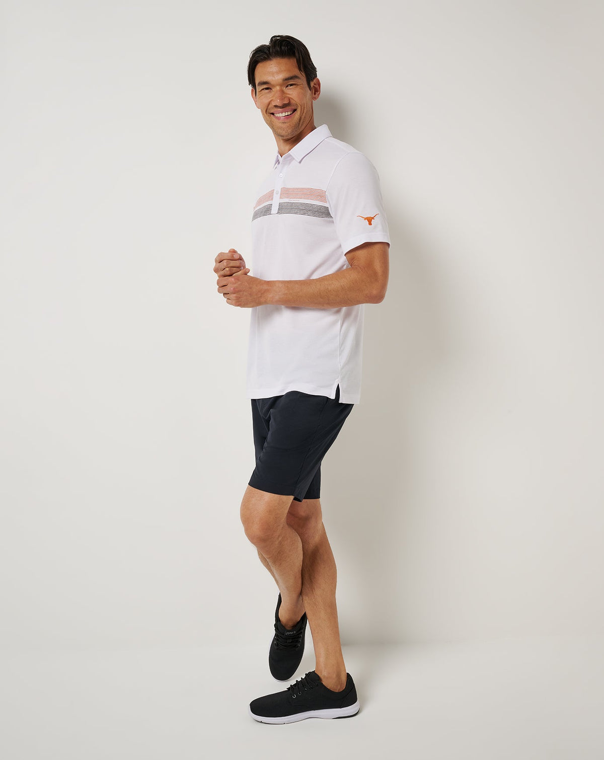 UT Austin Top Recruit Polo White/Orange | Travis Mathew