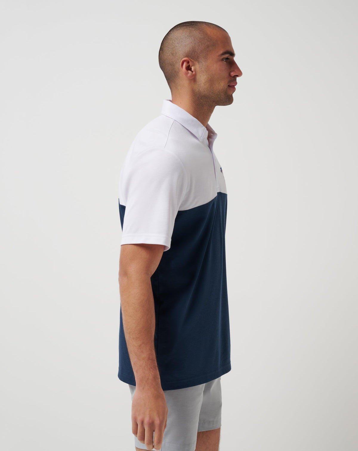 Toronto Blue Jays Home Run Leader Polo White/Navy | Travis Mathew