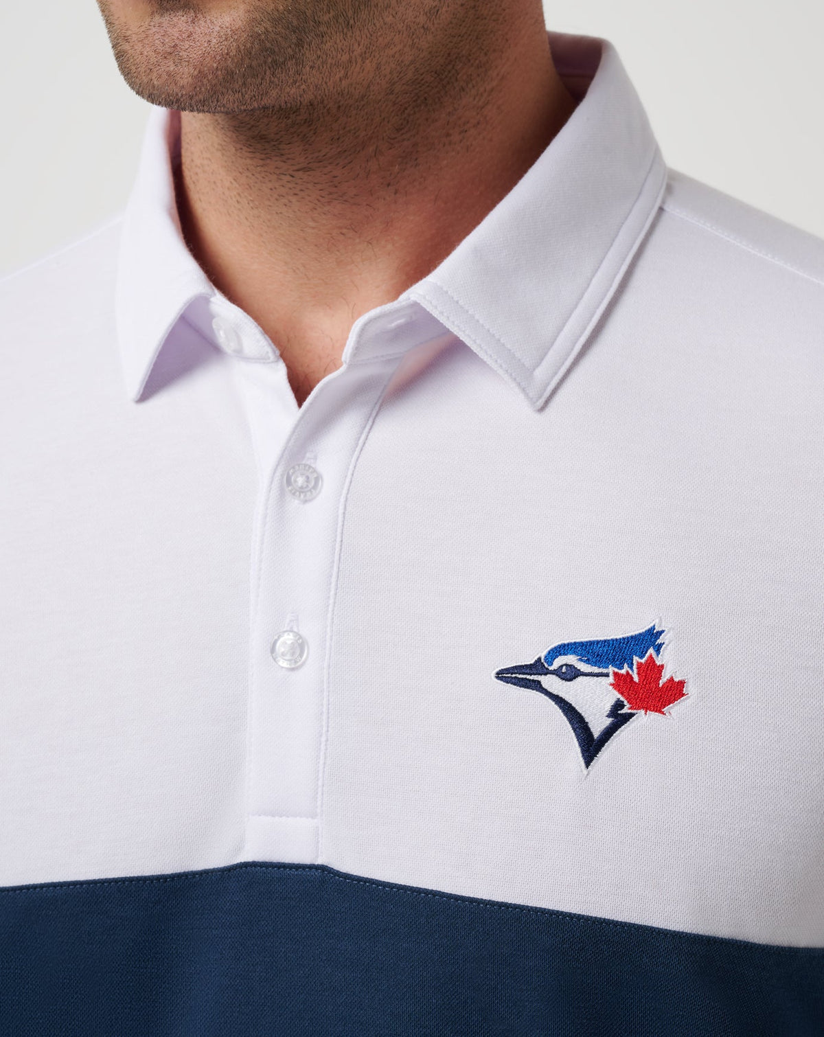 Toronto Blue Jays Home Run Leader Polo White/Navy | Travis Mathew