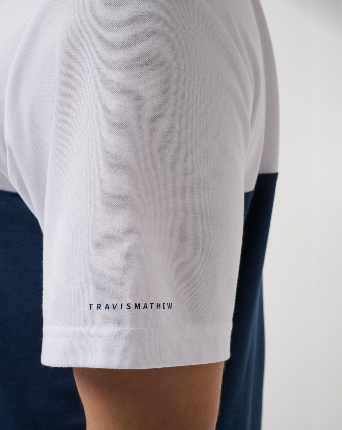 Toronto Blue Jays Home Run Leader Polo White/Navy | Travis Mathew