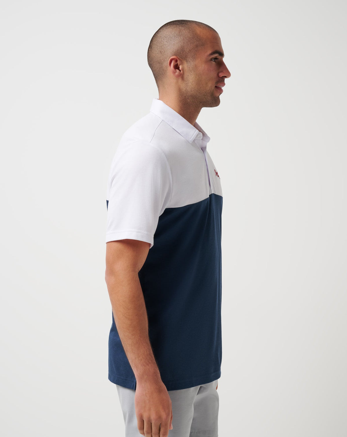 Atlanta Braves Home Run Leader Polo White/Navy | Travis Mathew