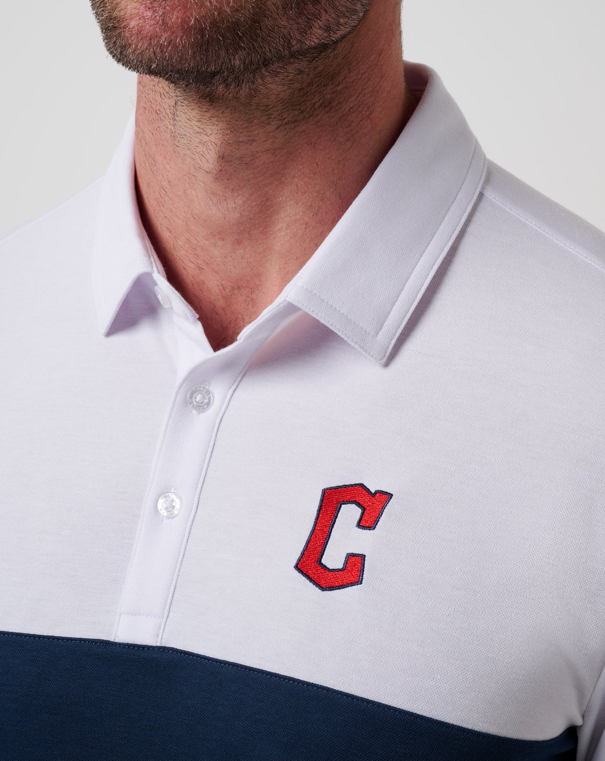 Cleveland Guardians Home Run Leader Polo White/Navy | Travis Mathew