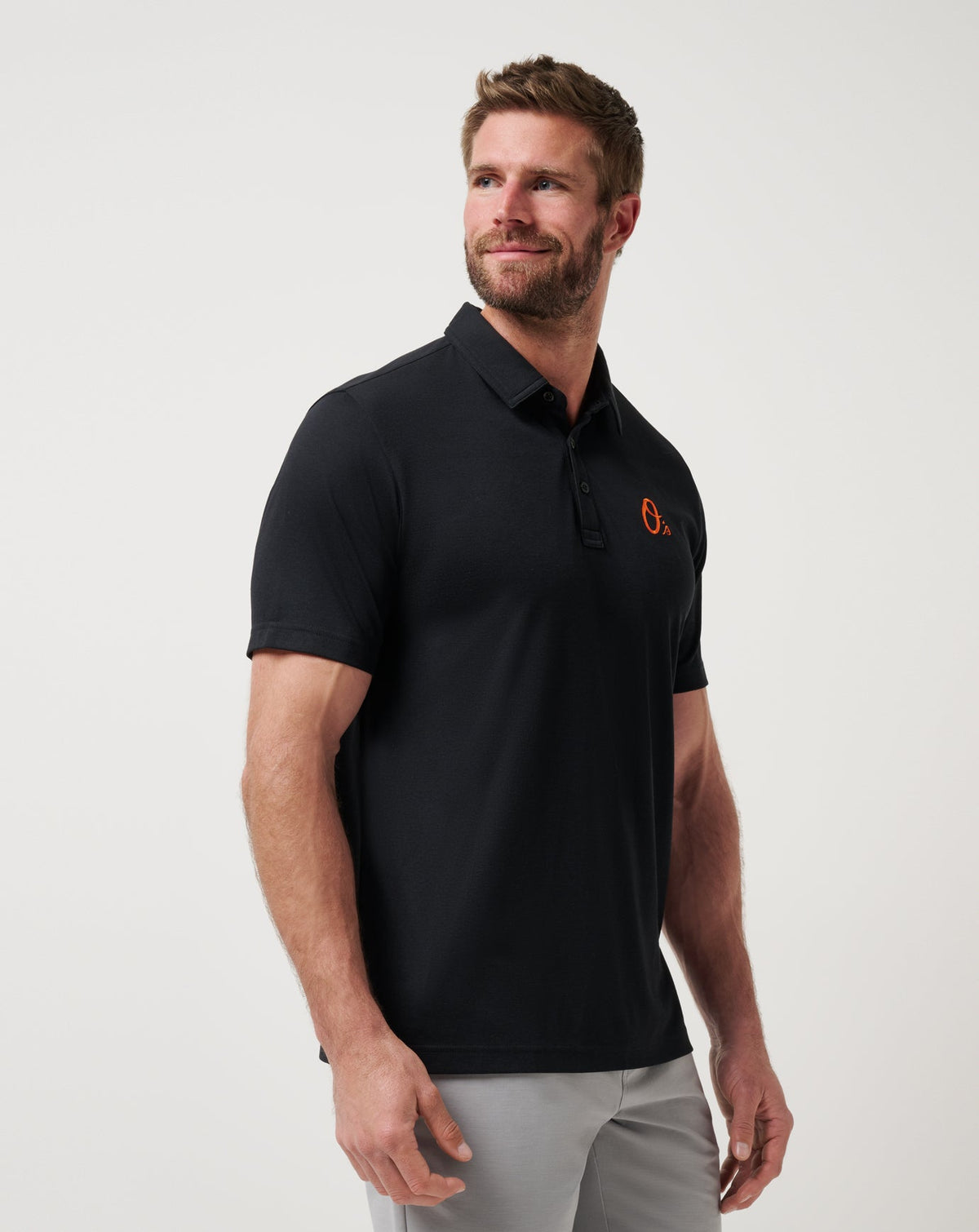 Baltimore Orioles Playoff Pitch Polo Black | Travis Mathew