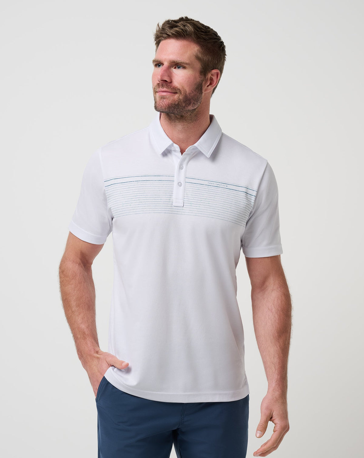 Overstay Polo White | Travis Mathew