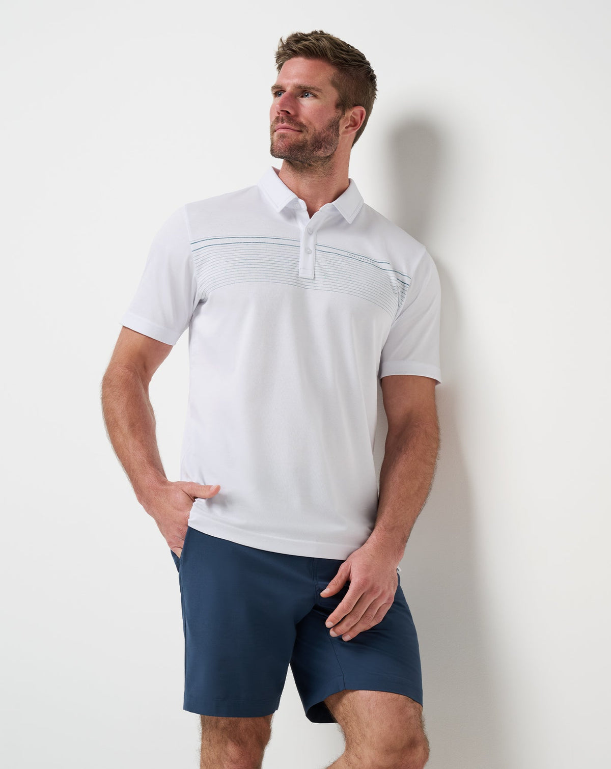 Overstay Polo White | Travis Mathew