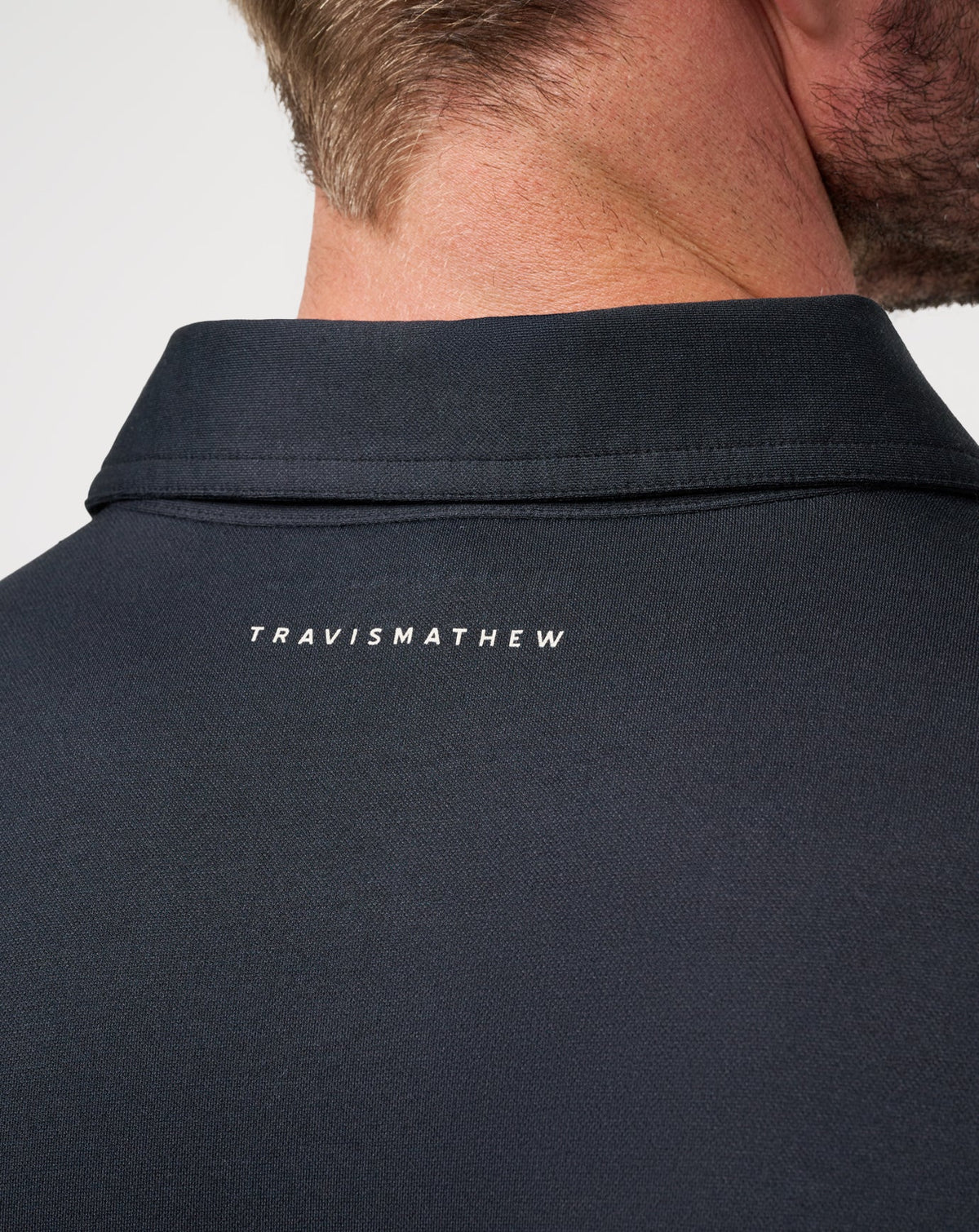 Featherweight On The Grind Polo Black | Travis Mathew