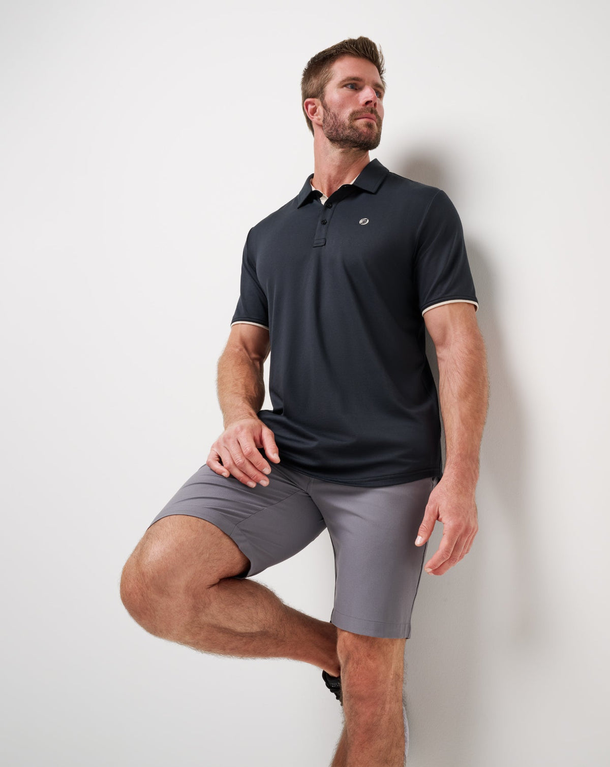 Featherweight On The Grind Polo Black | Travis Mathew