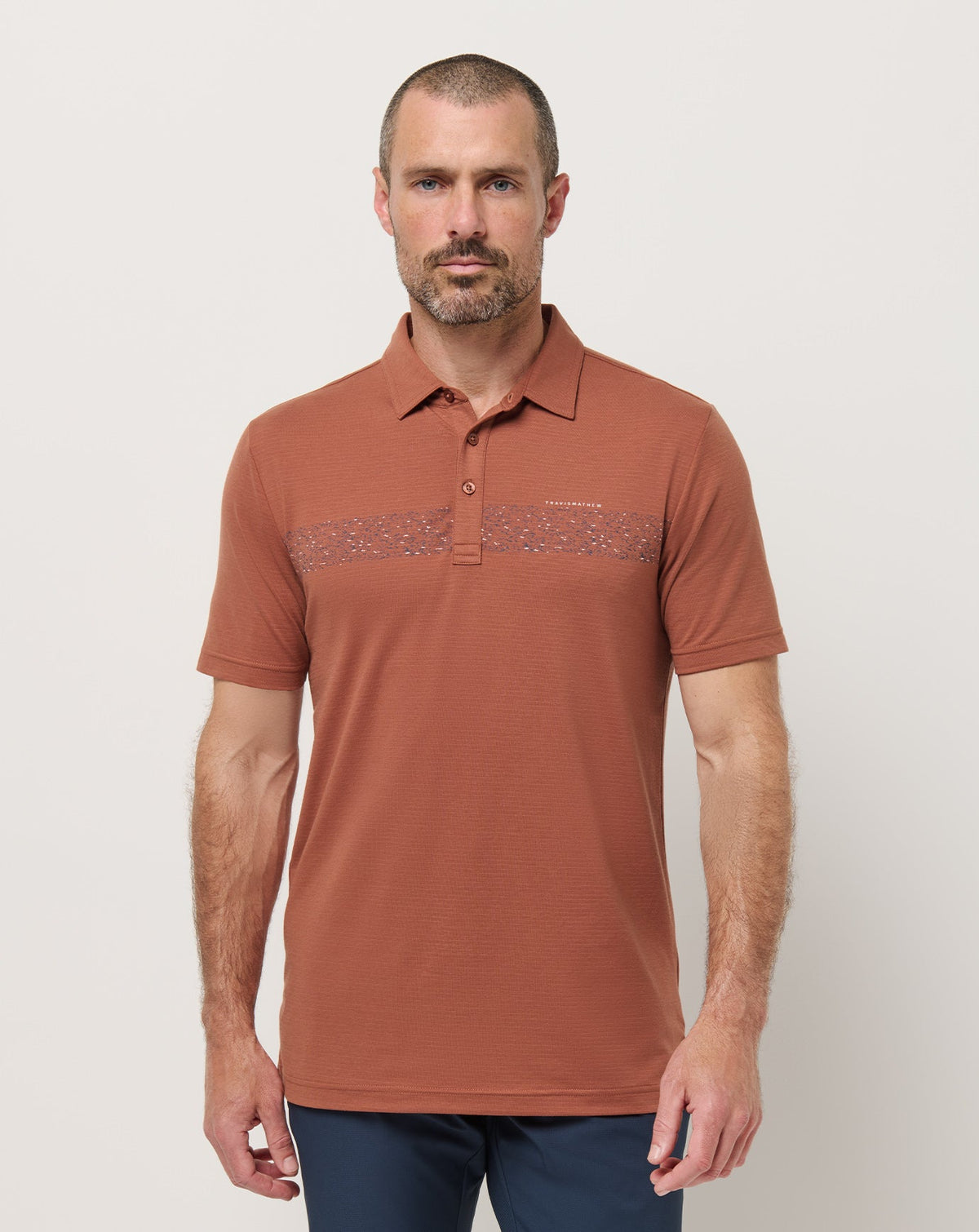 The Heater Chest Stripe Polo Maple | Travis Mathew