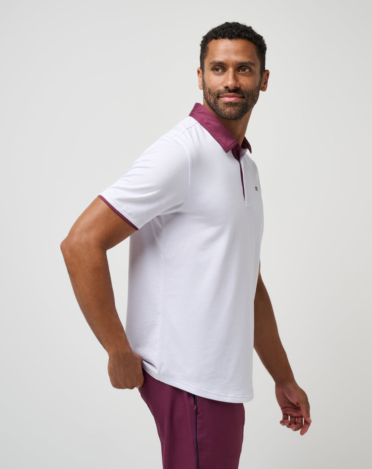 Home Game Polo White | Travis Mathew