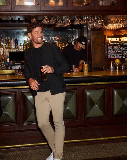 TM Social Club Bomber Heather Black | Travis Mathew