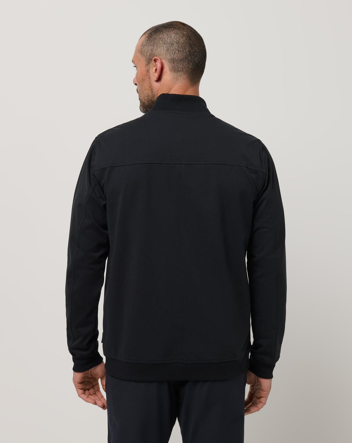Stretchknit Bomber Jacket Black | Travis Mathew