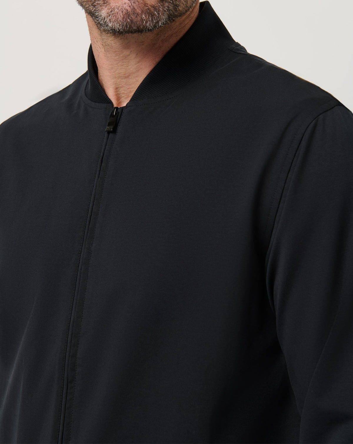 Stretchknit Bomber Jacket Black | Travis Mathew
