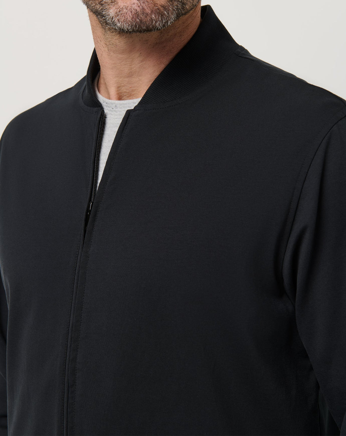 Stretchknit Bomber Jacket Black | Travis Mathew
