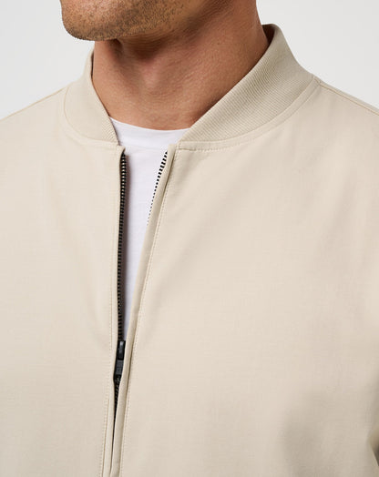 Stretchknit Bomber Jacket Italian Sand | Travis Mathew