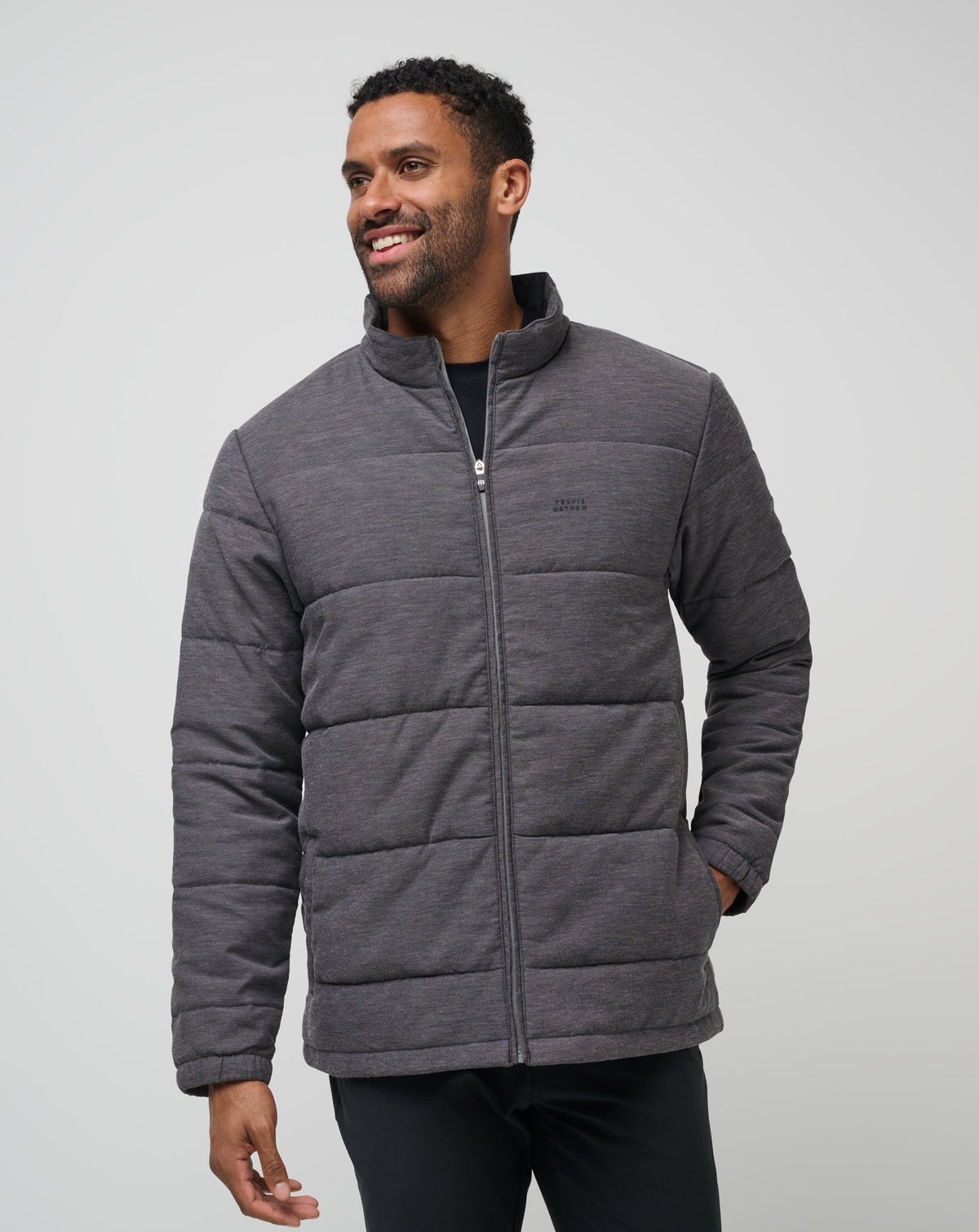 Climate Drop Jacket Heather Black | Travis Mathew