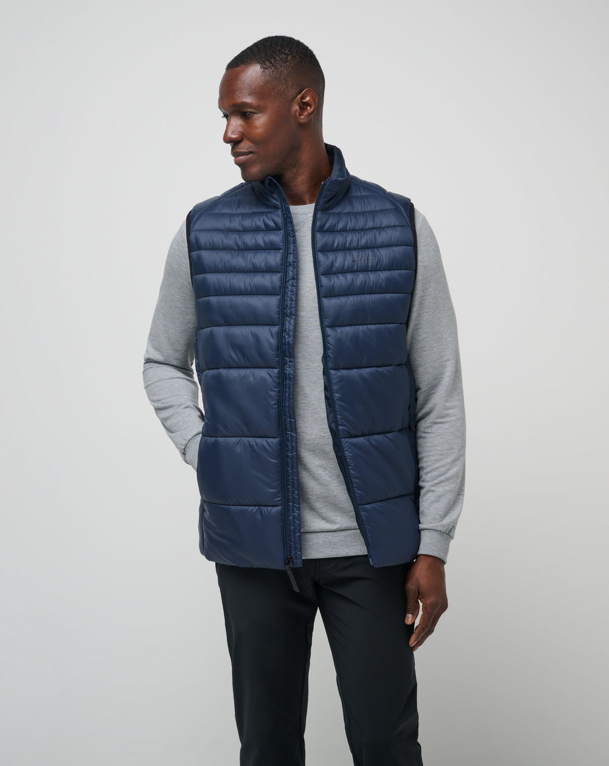 Aves Tech Puffer Vest Total Eclipse | Travis Mathew
