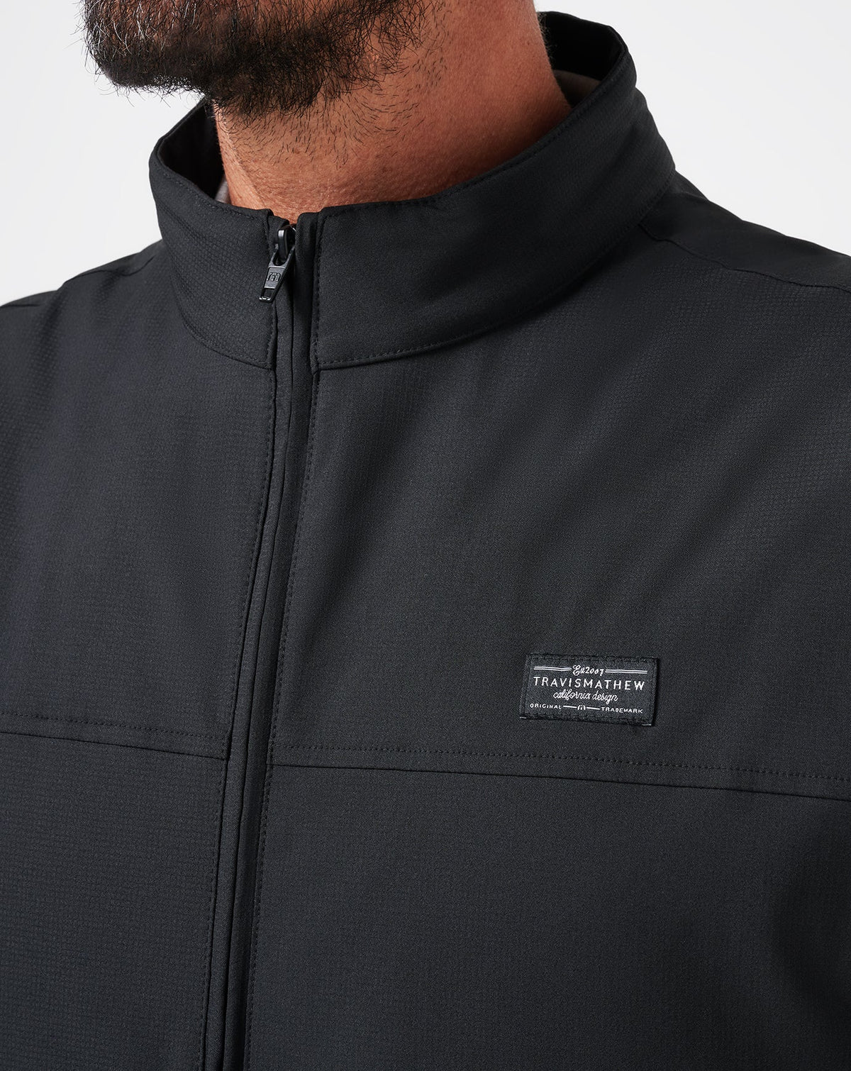 Wanderlust Vest Black | Travis Mathew