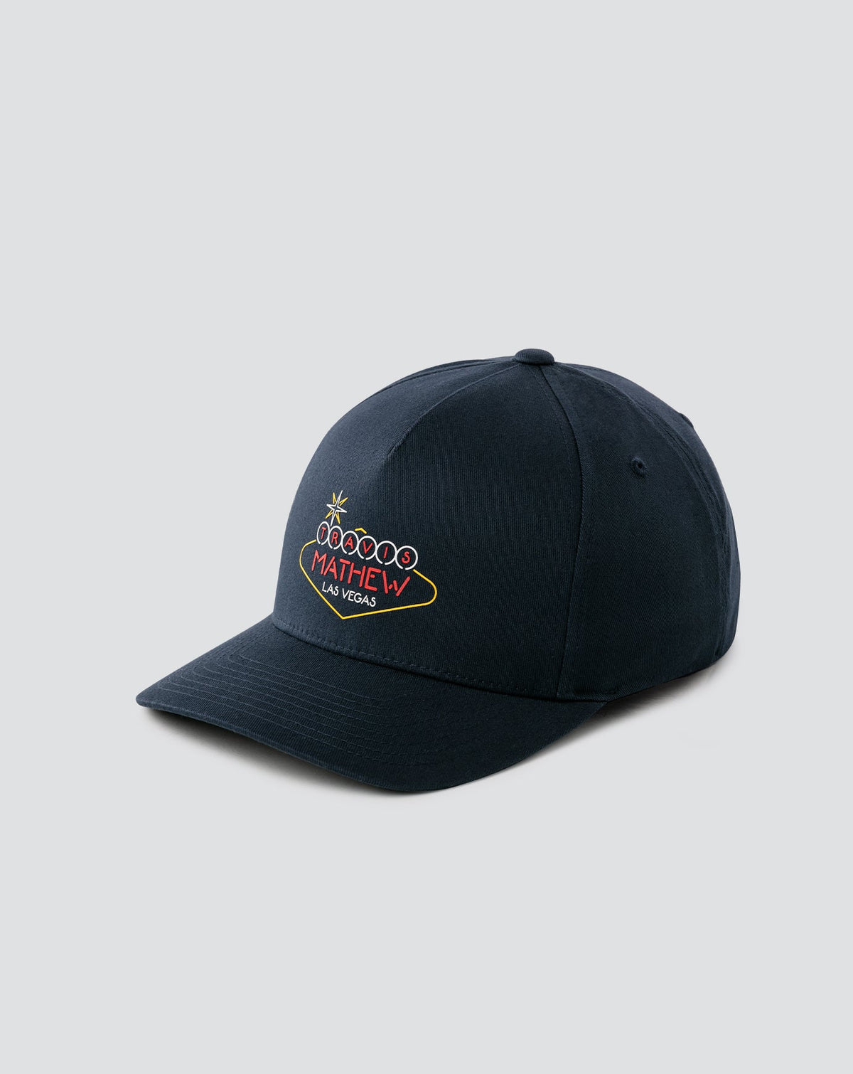 Neon Magic Snapback Hat Dark Blue | Travis Mathew