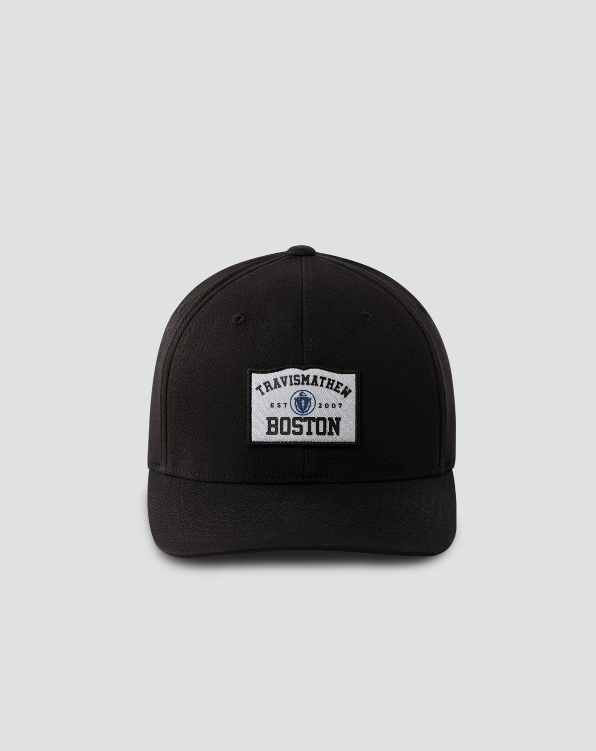 Boylston Fitted Hat Black | Travis Mathew