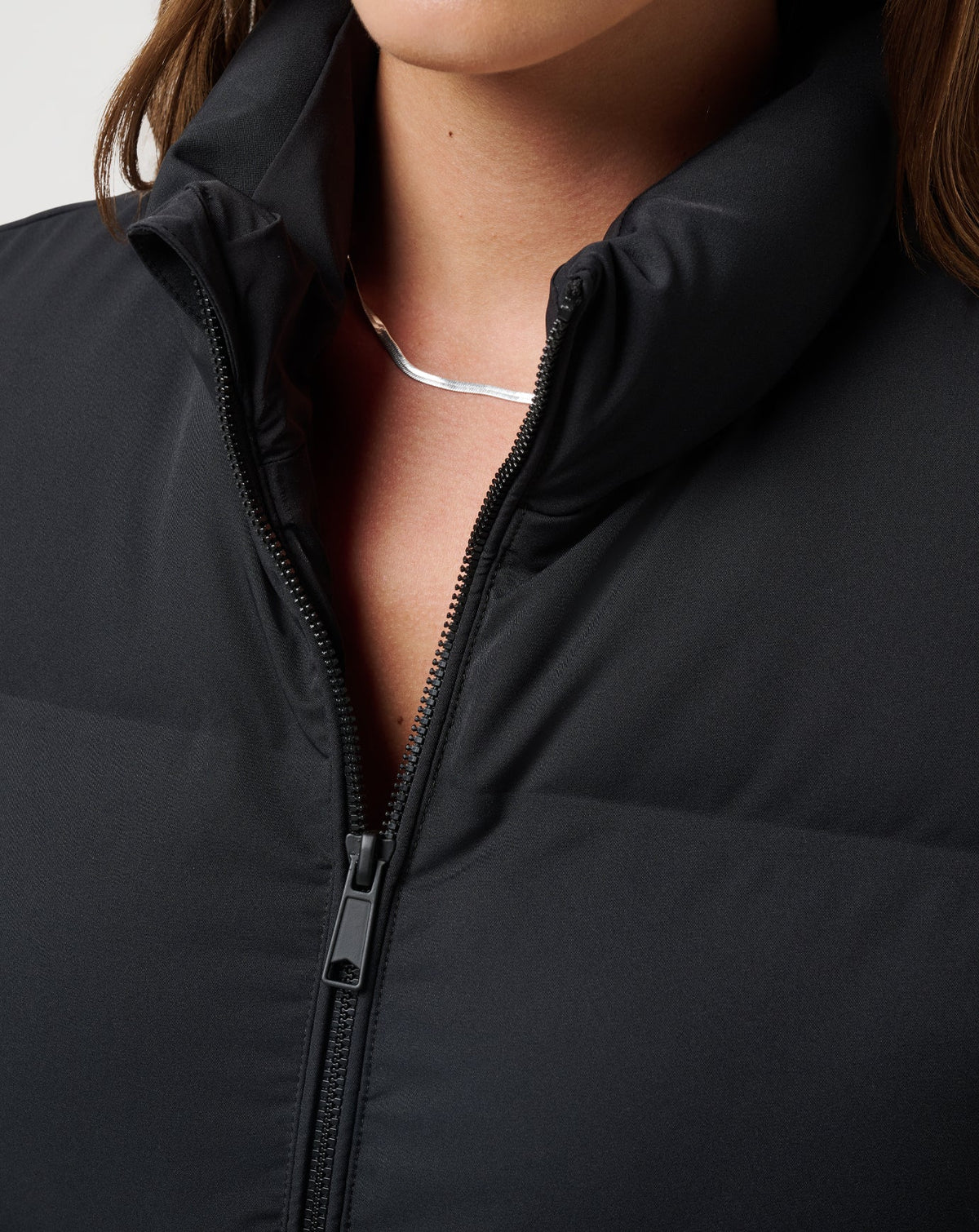 Moontide Bonded Puffer Vest Black | Travis Mathew