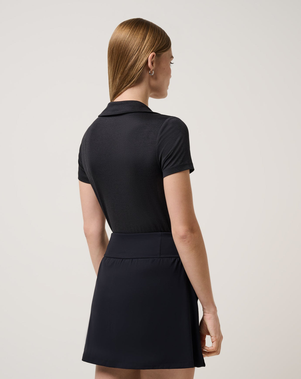 Skyloft Light Polo Heather Black | Travis Mathew