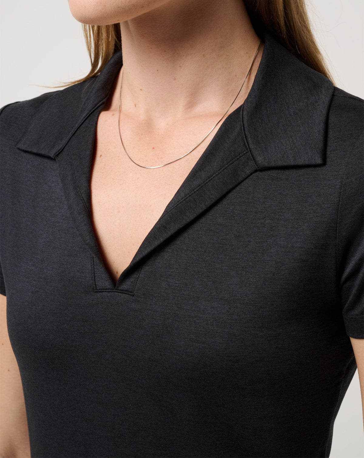 Skyloft Light Polo Heather Black | Travis Mathew