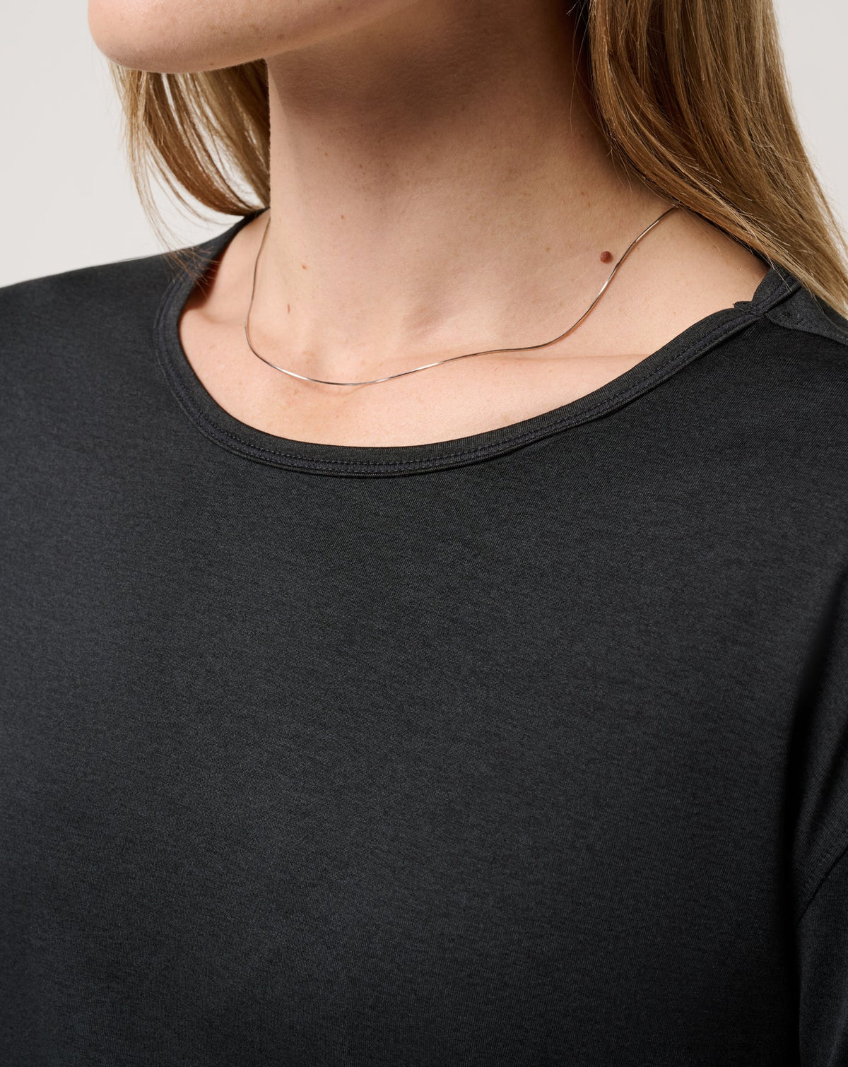Skyloft Light Celestia Top Heather Black | Travis Mathew
