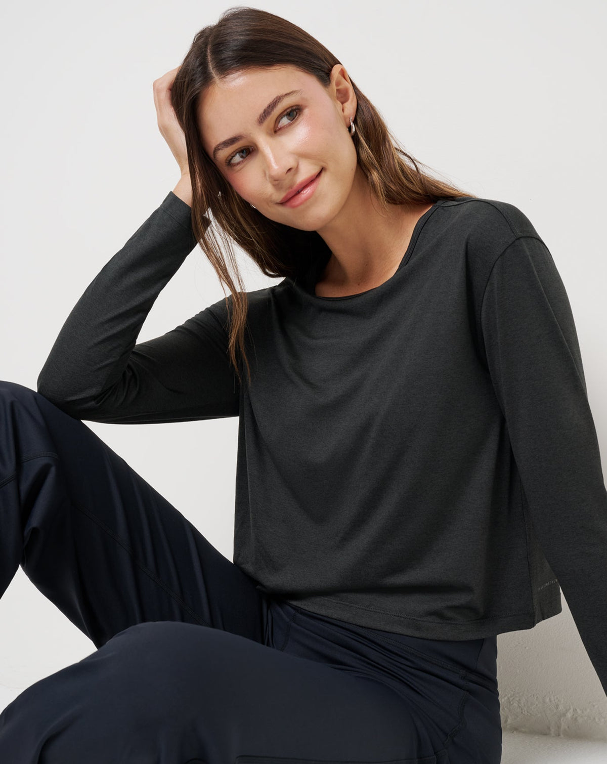 Skyloft Light Celestia Top Heather Black | Travis Mathew