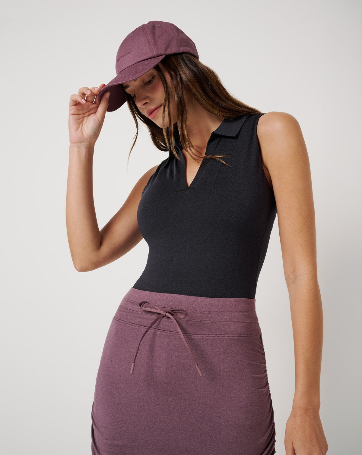 Skyline Polo Bodysuit Heather Black | Travis Mathew