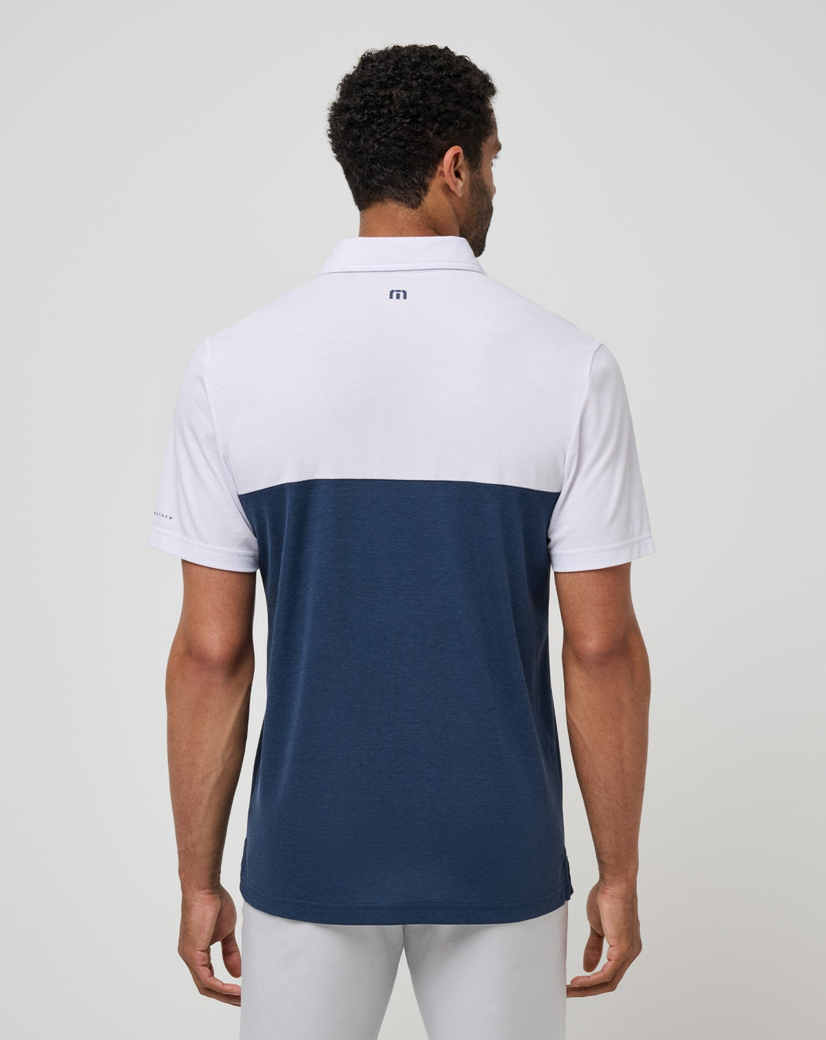 Auburn Drop Back Polo White/Navy | Travis Mathew