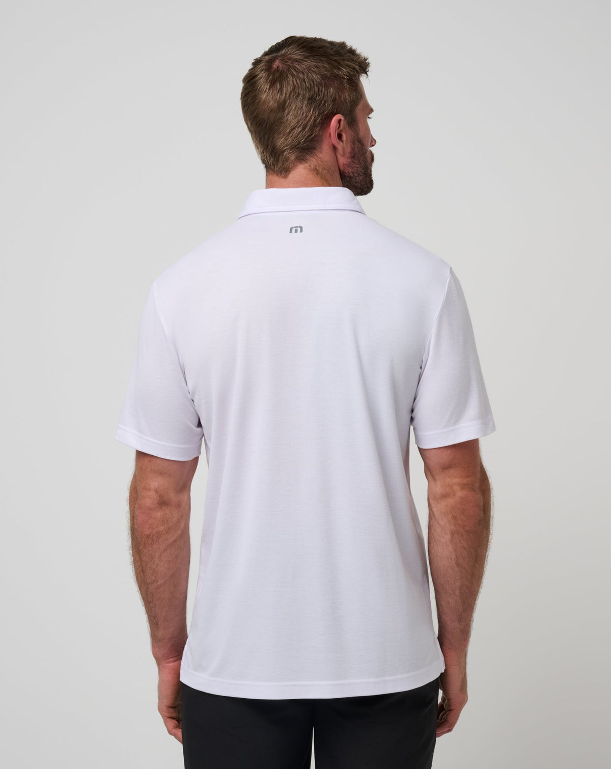 Nebraska Top Recruit Polo White/Black | Travis Mathew