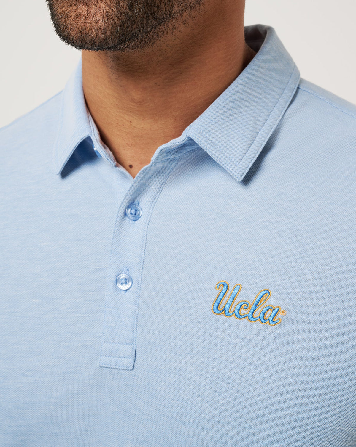 UCLA School Pride Polo Heather Blue | Travis Mathew