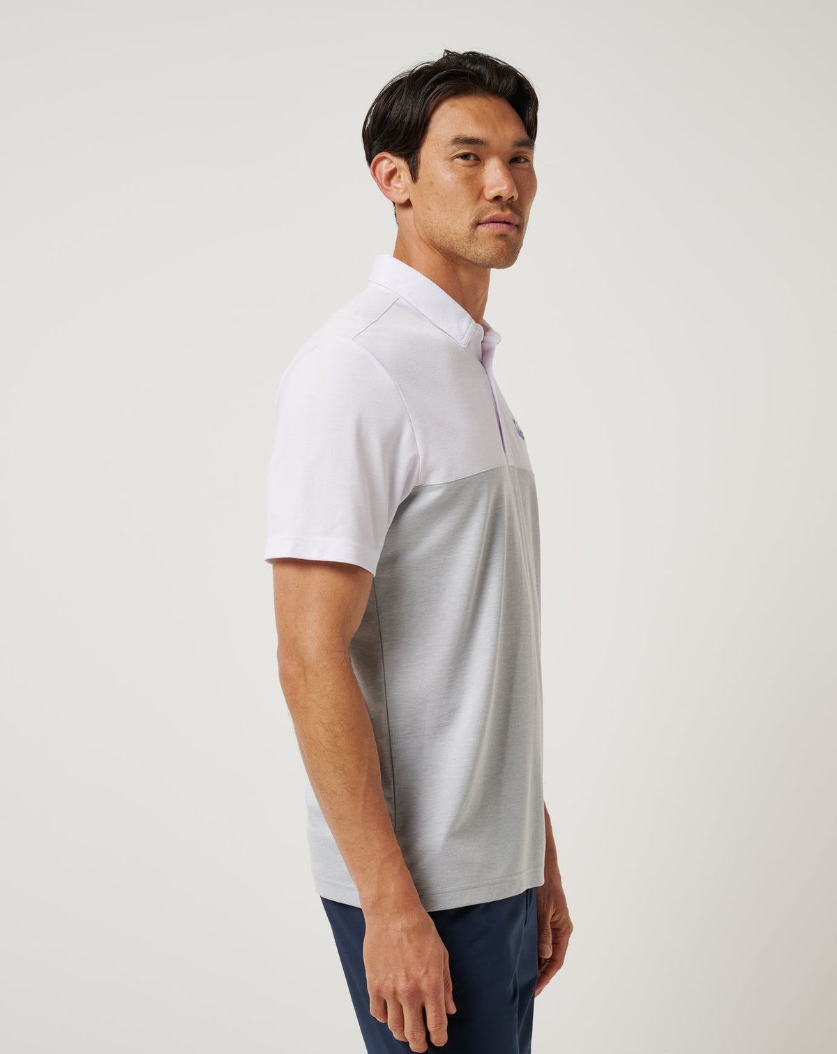 UCLA Drop Back Polo White/Heather Grey | Travis Mathew