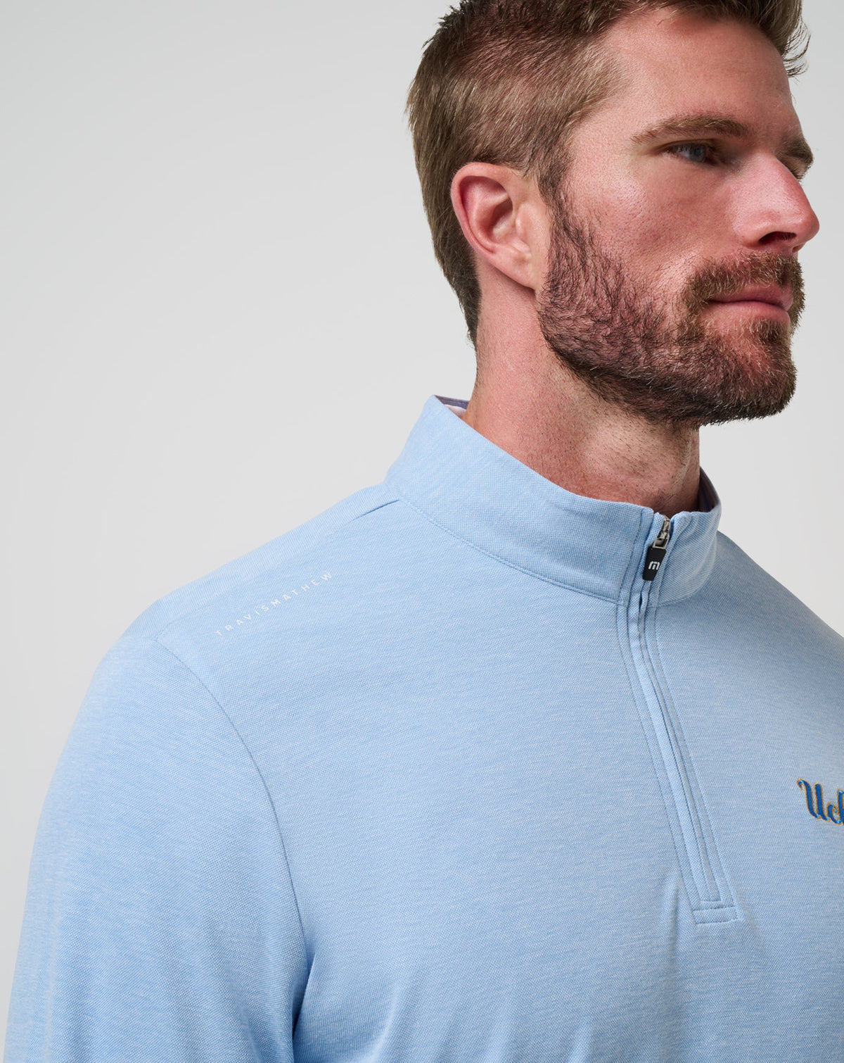 UCLA Time To Tailgate Quarter Zip Heather Blue | Travis Mathew