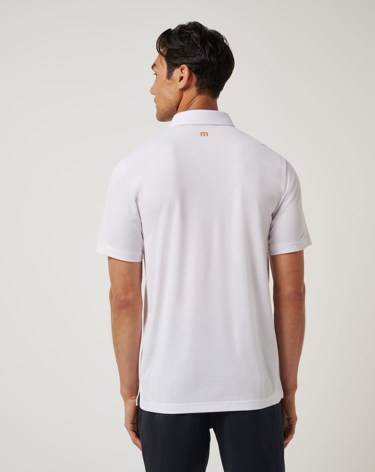 UT Austin Top Recruit Polo White/Orange | Travis Mathew
