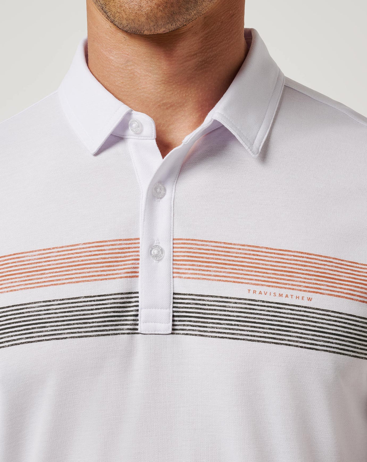 UT Austin Top Recruit Polo White/Orange | Travis Mathew