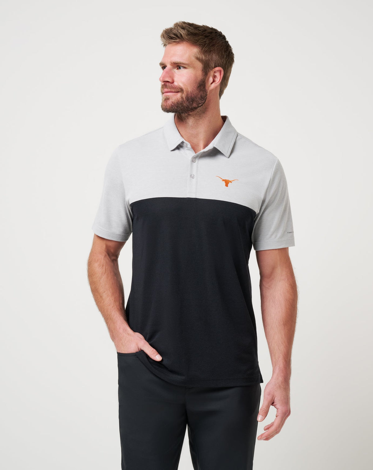 UT Austin Drop Back Polo Heather Grey/Black | Travis Mathew