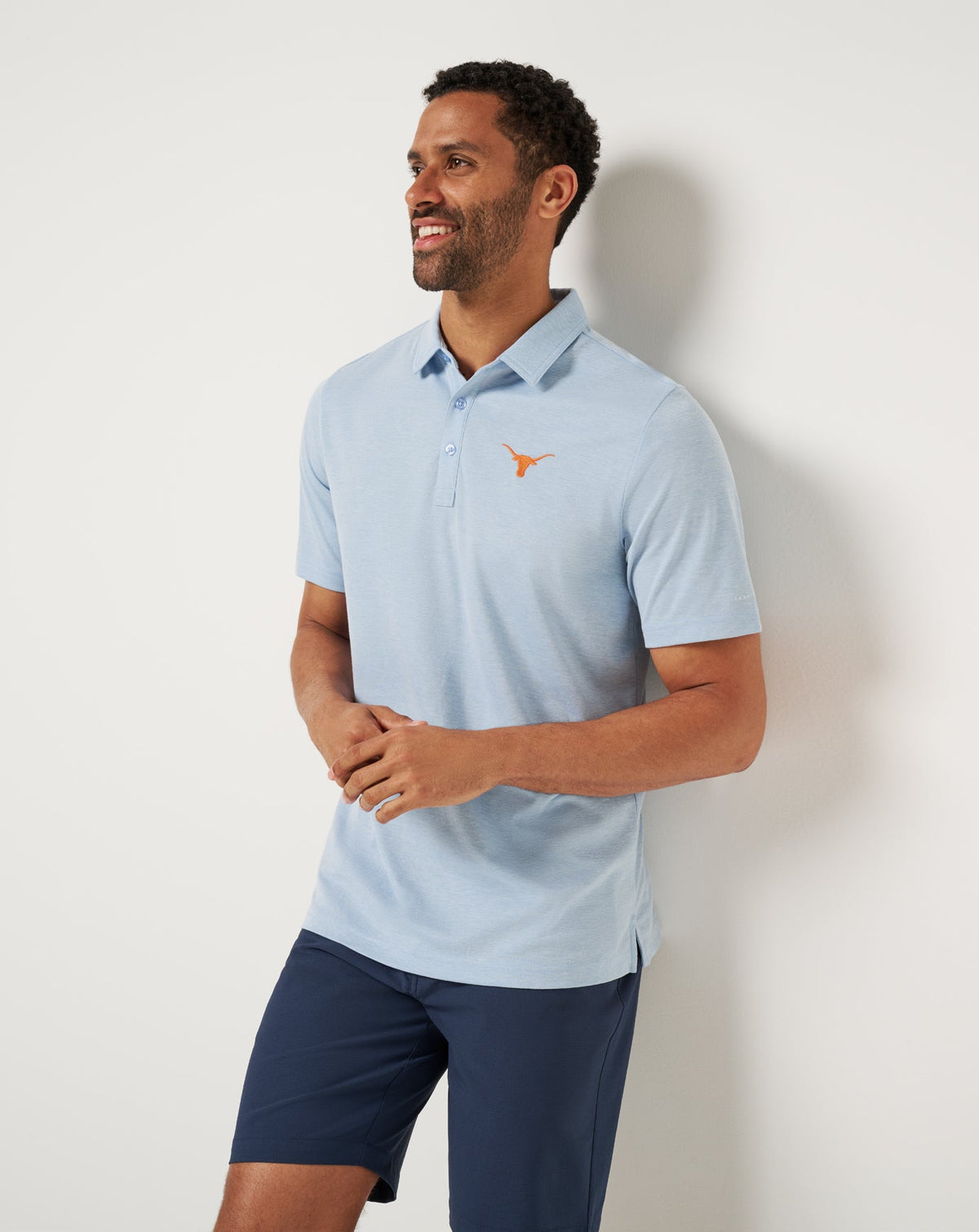 UT Austin School Pride Polo Heather Blue | Travis Mathew
