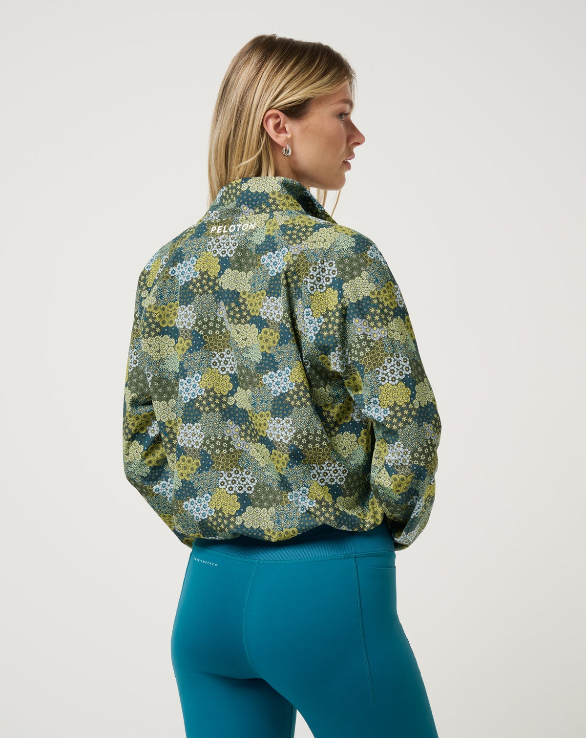 New Light Jacket Bronze Green Multi | Travis Mathew