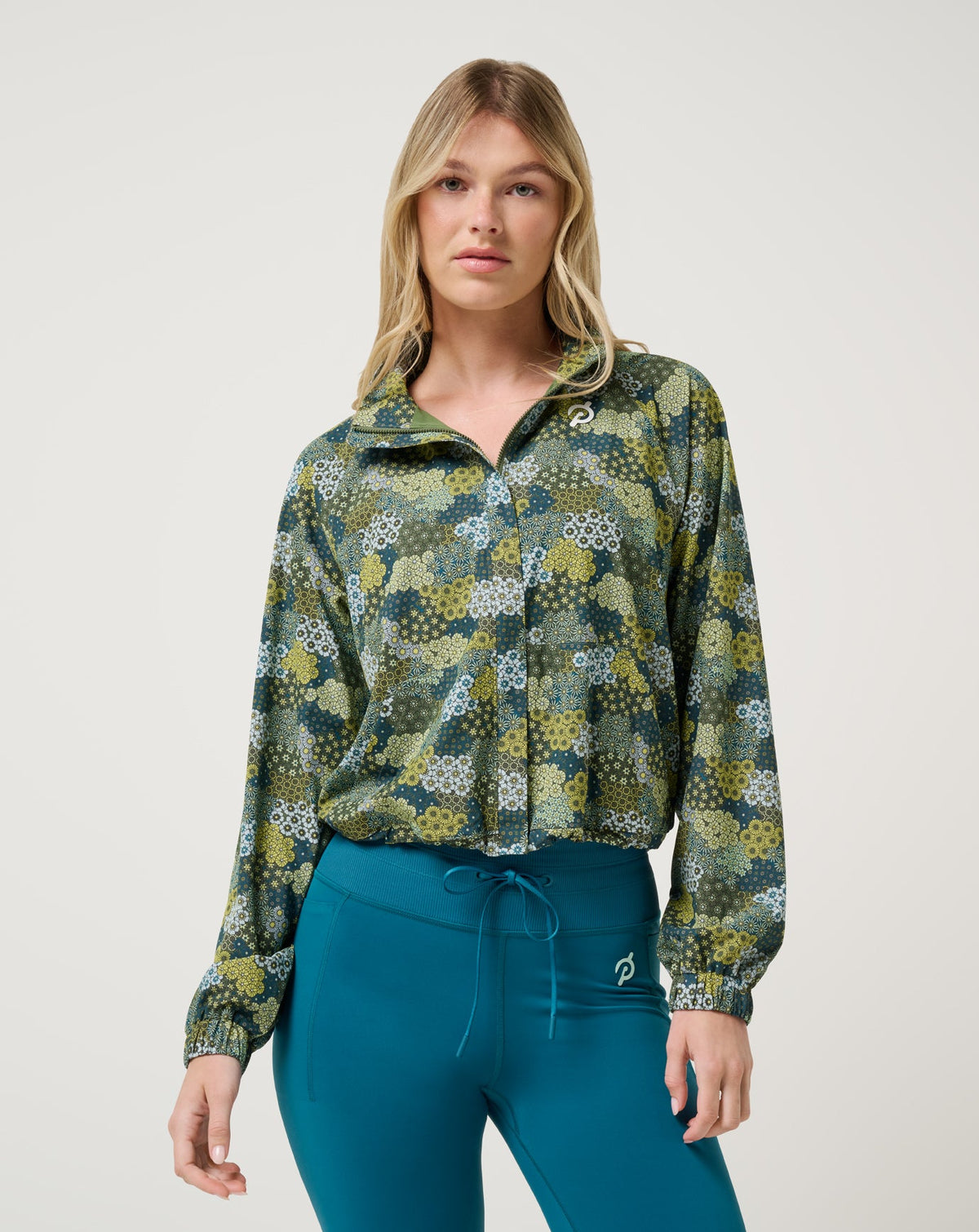 New Light Jacket Bronze Green Multi | Travis Mathew