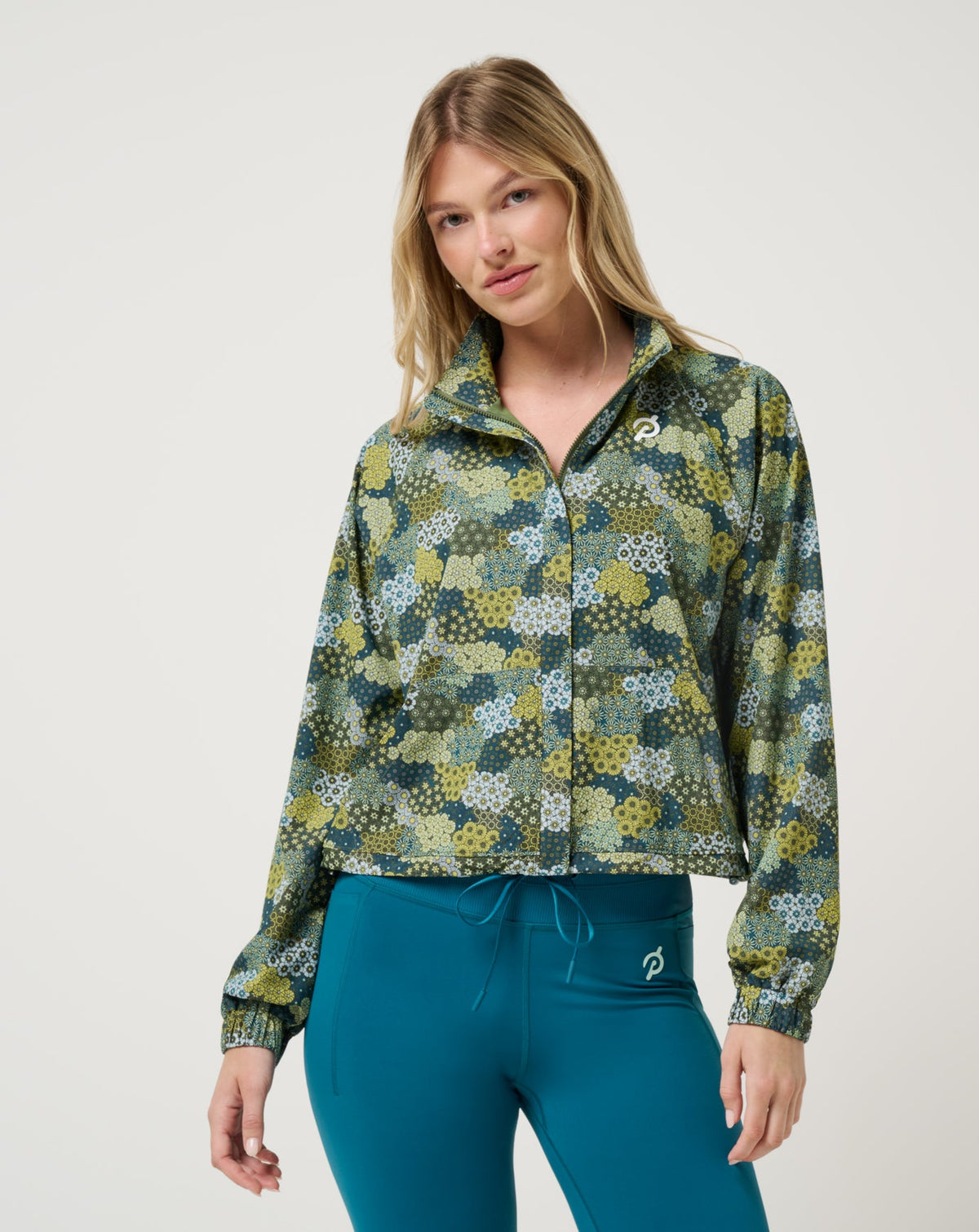 New Light Jacket Bronze Green Multi | Travis Mathew